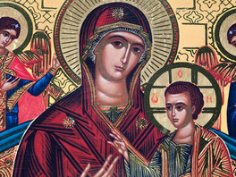 In Gold gehaltene Ikone mit Jesus auf den Armen Marias, sowie zwei Engel am Rand. Alle mit Heiligenschein und auffälligen Handgesten.